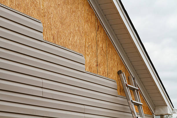 Professional Siding Contractor technician working in Manasquan, NJ